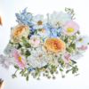 Originally created by Maddie Jaydee Designs, this beautiful, soft bouquet was a joy to draw. I love the combination of peach-coloured roses and blue flowers.